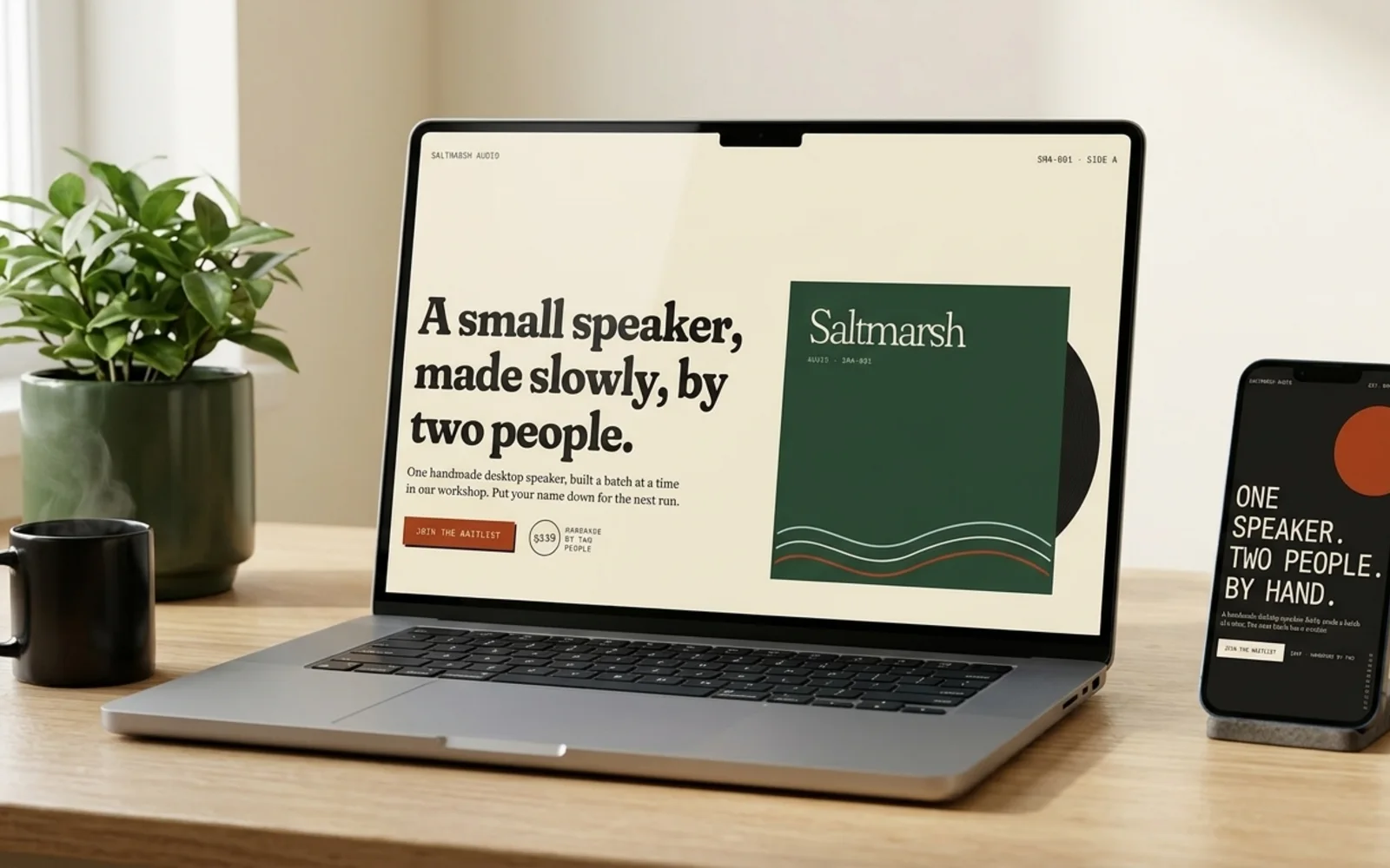 Abovefold's showcase pages shown in a photographic mockup: a laptop and a smartphone on a desk showing the landing page, a plant and coffee nearby